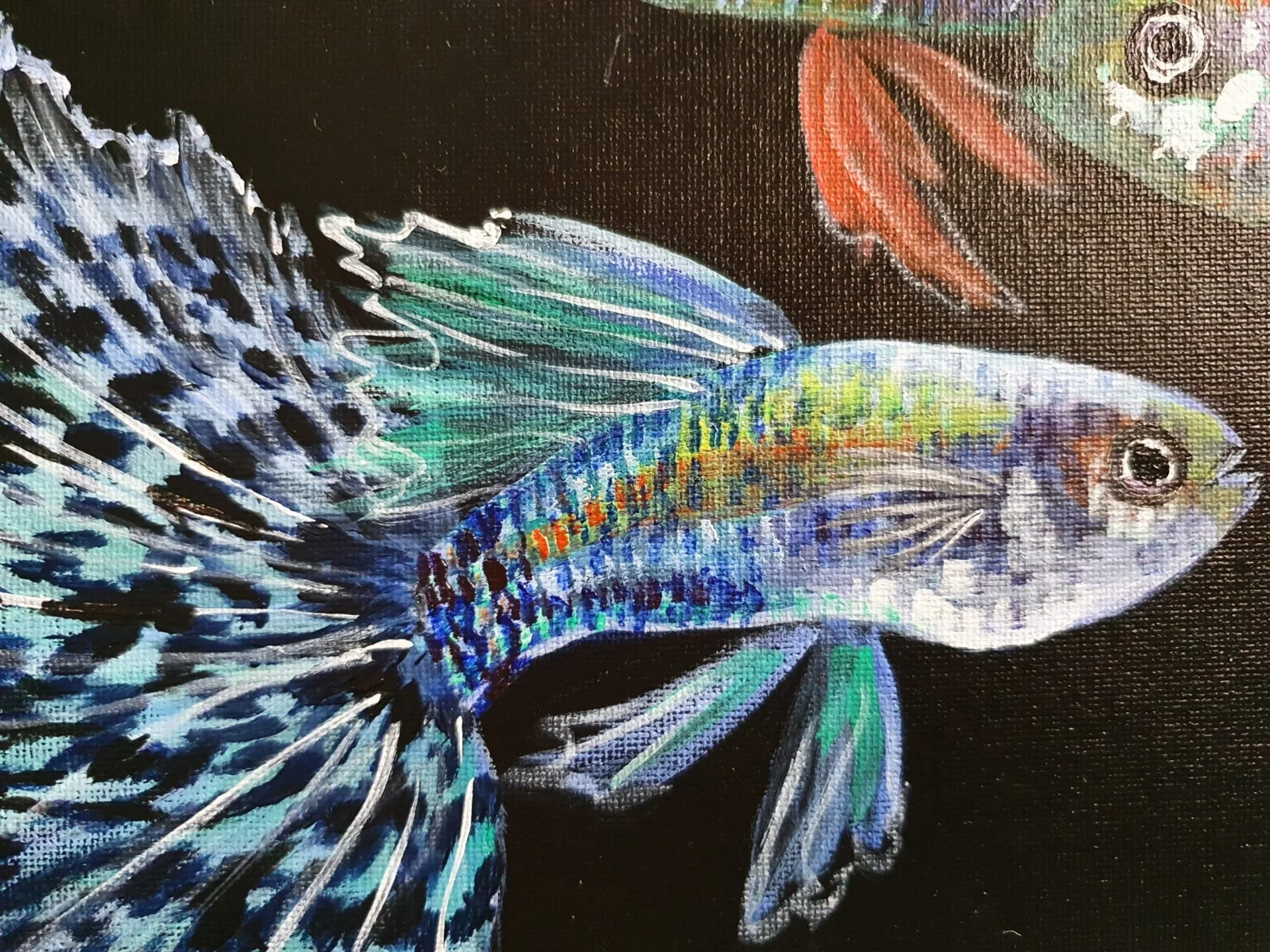 Danielle Art Original Acrylic and Oil Paintings Colorful guppy fish painting by Danielle Siauw, showcasing vibrant blues, greens, and oranges.