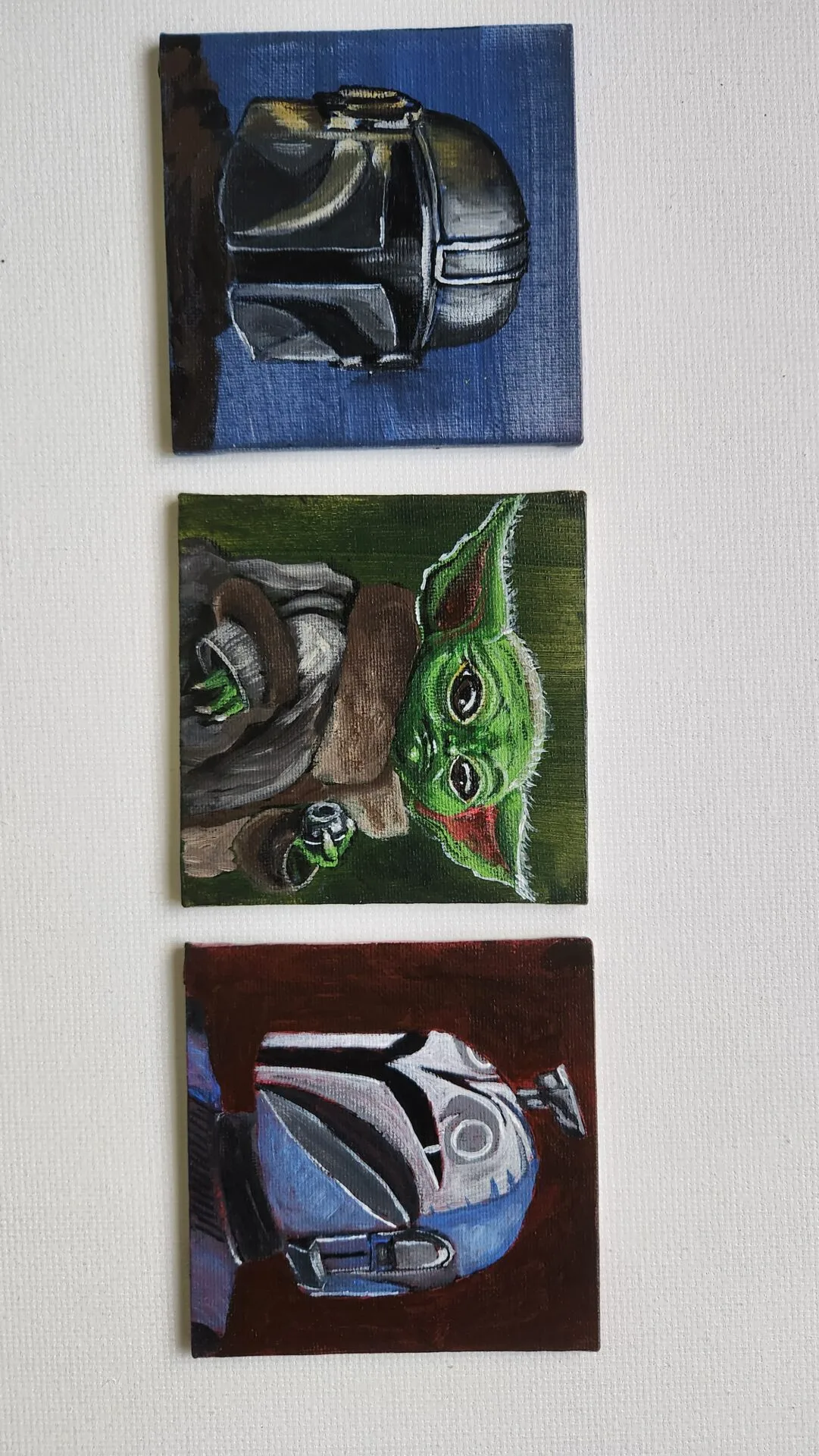 Danielle Art Original Acrylic and Oil Paintings The Mandalorian Bo Katan helmet painting, Grogu (Baby Yoda) painting, and Stormtrooper helmet painting