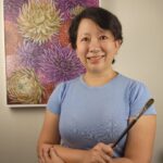 Danielle Art Original Acrylic and Oil Paintings Artist Danielle Siauw with her floral painting, "Embracing Artistic Evolution