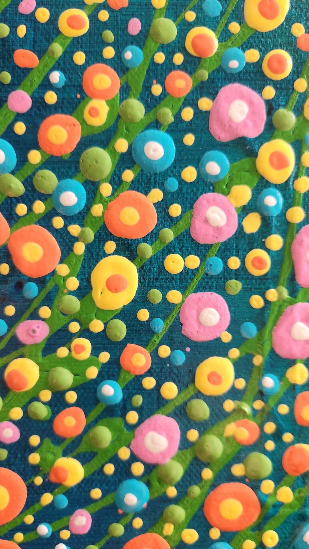 Danielle Art Original Acrylic and Oil Paintings Colorful dot art on blue canvas with green stems. Abstract painting with circles in pink, yellow, orange, and blue.