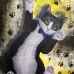 Tuxedo Cat painting with a playful black-and-white cat and paw prints on a yellow background.