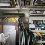 Danielle Art Original Acrylic and Oil Paintings Art studio storage: Canvases, paints, and supplies neatly organized on shelves. #artstudio