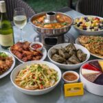 Danielle Art Original Acrylic and Oil Paintings Delicious Thai feast: Tom yum soup, fried fish, papaya salad, chicken wings, desserts, and white wine.