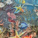 Danielle Art Original Acrylic and Oil Paintings Detailed embroidery art depicting a vibrant underwater scene with colorful fish and coral.
