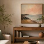Original artwork thoughtfully placed in a calm home interior with warm natural light